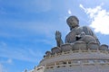 Outdoor bronze statue of seated Tian Tan Buddha in Hong Kong Royalty Free Stock Photo