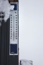 Large outdoor thermometer. On a scale of minus 17 degrees Celsius