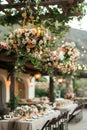 A large outdoor wedding reception with a lot of flowers and candles Royalty Free Stock Photo