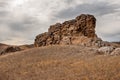 Large outlier on a hill in the steppe.