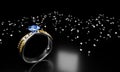 The large oval blue diamond is surrounded by many diamonds on the ring made of platinum gold placed on a white background. 3d Royalty Free Stock Photo
