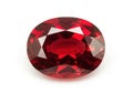 A large oval cut ruby gemstone on a white background Royalty Free Stock Photo