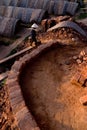 Large ovens, kilns, used to cure clay bricks in Vietnam