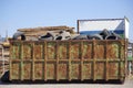 Large overflowing garbage container filled with worn-out tires Royalty Free Stock Photo