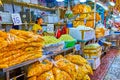 Large packs with marigold flowers for religion ceremonies in Pak Khlong Talat Flower Market in Bangkok, Thailand