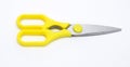 A large pair of scissors with yellow handles Royalty Free Stock Photo