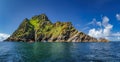 Large panorama with cruise boats docking to Skellig Michael island, where Star Wars were filmed Royalty Free Stock Photo