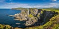 Large panorama with majestic Kerry Cliffs and Atlantic Ocean, Ring of Kerry