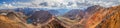 Large panorama, mountain landscape. Colored rocks, lake in the gorge. Royalty Free Stock Photo