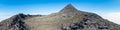 Large panoramic view of the pit crater rim and the pinnacle of the stratovolcano Mt Pico on Pico Island of the Azores