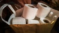 A large paper bag full of rolls of toilet paper. Toilet ware reserves. Shortage due to global coronavirus pandemic