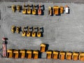 Large parking lot with big yellow mining truck, bulldozers for coal industry, ore and gold. Concept sale of industrial Royalty Free Stock Photo