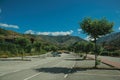 Large parking lot with hilly landscape