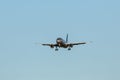 Large passenger plane on a blue sky background