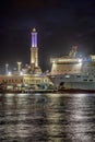 Large passenger liner in front of Genoa Lighthouse Royalty Free Stock Photo