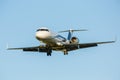 Large passenger plane on a blue sky background