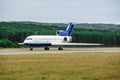 Large passenger plane on the taxiway at the airport Royalty Free Stock Photo