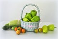 Large Peppers cucumbers and tomatoes green in basket Royalty Free Stock Photo