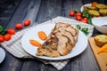 A large piece of baked meat Still life on a light wooden table Royalty Free Stock Photo