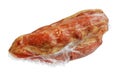 Large piece of boiled-smoked pork in a vacuum package isolated