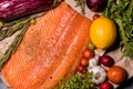 A large piece of fresh salmon fillet on the table