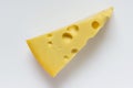 Large piece of Maasdam cheese with large pores holes