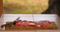 Large piece of raw red meat ready to be grilled. Typical argentinian food, asado Royalty Free Stock Photo