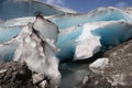 A large pieces of ice from a glacier melting in the Norwegian mountain