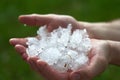 large pieces of ice hail in the palm of your hand. Royalty Free Stock Photo