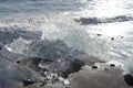 large pieces of iceburg on black sand beach in Iceland