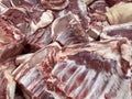 Large pieces of pork after butchering the carcass. Trade in fresh meat wholesale and retail. Close-up. Texture