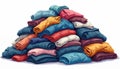 Large pile of colorful clothes shown. Clothes rolled, layered, creating visually interesting stack. Various colors like blue,