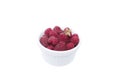 Large pile of fresh raspberries in white bowl isolated on white background Royalty Free Stock Photo