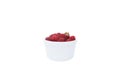 Large pile of fresh raspberries in white bowl isolated on white background Royalty Free Stock Photo