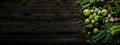 a large pile of fresh vegetables on a table top with a dark wooden background Royalty Free Stock Photo