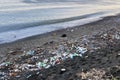 A large pile of garbage from plastic bottles on the shore of the sea Royalty Free Stock Photo