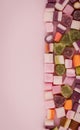 A large pile of mixed sweets on wooden background Royalty Free Stock Photo