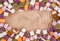 A large pile of mixed sweets on wooden background Royalty Free Stock Photo