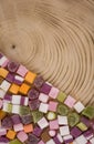 A large pile of mixed sweets on wooden background Royalty Free Stock Photo