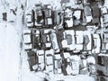 A large pile of old cars prepared for recycling in the winter season, photo taken from a flying machine