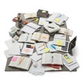 A large pile of open and closed notebooks papers and stationery items isolated on white background Royalty Free Stock Photo