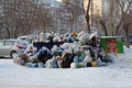 A large pile of plastic bags of garbage and household waste in the city dump in the winter in Novosibirsk pollutes the environment Royalty Free Stock Photo