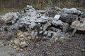 A large pile of rubbish from pieces of gray concrete