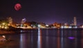 Large pink moon over the Patong beach skies of Phuket Thailand Royalty Free Stock Photo