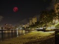 Large pink moon over the skies of Waikiki Beach Honolulu Hawaii Island USA Royalty Free Stock Photo