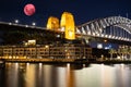 Large Pink moon rising behind Sydney CBD buildings NSW Australia Royalty Free Stock Photo