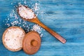 Large pink sea salt on blue background Royalty Free Stock Photo