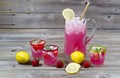 Large pitcher of lemonade with glassware Royalty Free Stock Photo