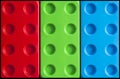 Large plastic building blocks toy in RGB colors as a background. Three Primary Colors, Red, Green and Blue Royalty Free Stock Photo