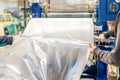 large plastic roll in the factory for the production of plastic packaging material and bags Royalty Free Stock Photo